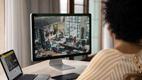 Boss watching coffee shop from Guardian Alarm App