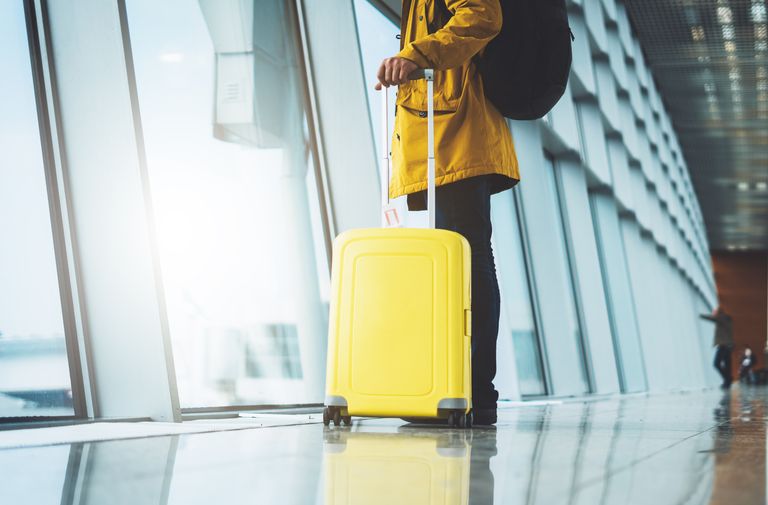 Person with luggage at the airport