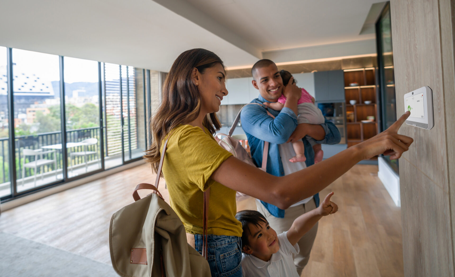 Family arming Guardian Alarm wall panel