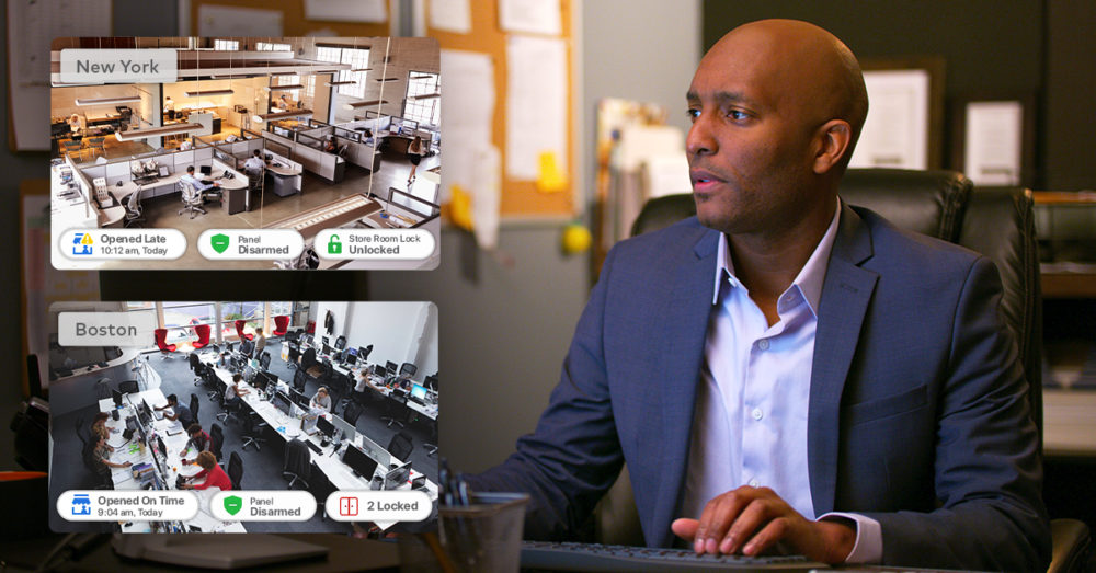 Person looking at multiple offices' security cameras across the United States