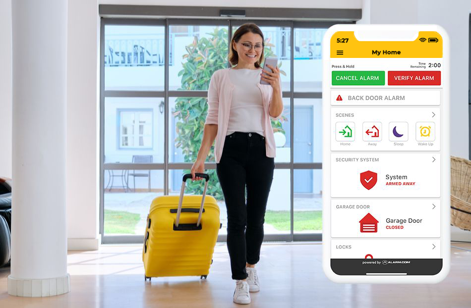 Woman returing from Airport with luggage checking her My Guardian Alarm App