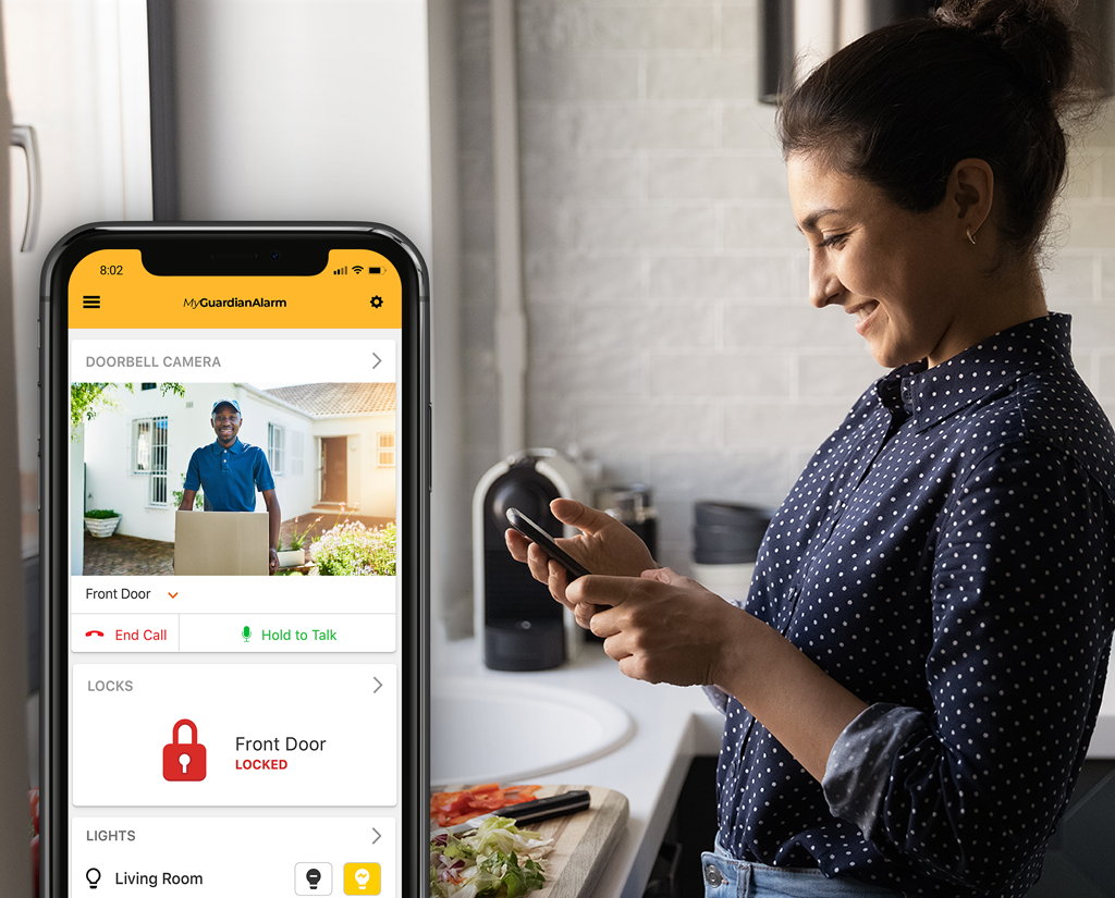 Woman looking at front door video doorbell video camera